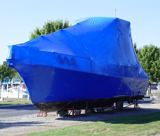 Shrink wrapped boat outside storage